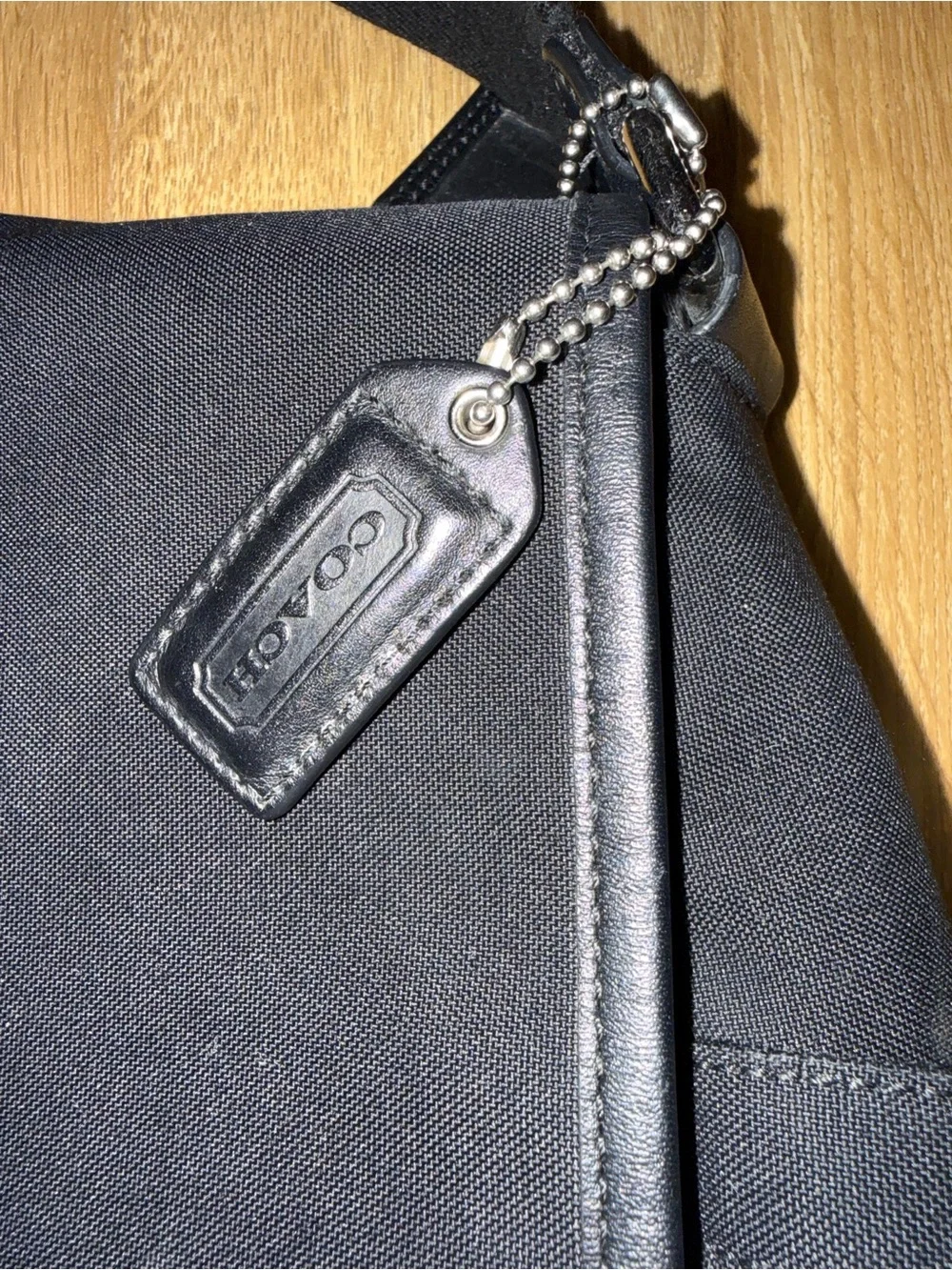 Coach leather trim messenger bag